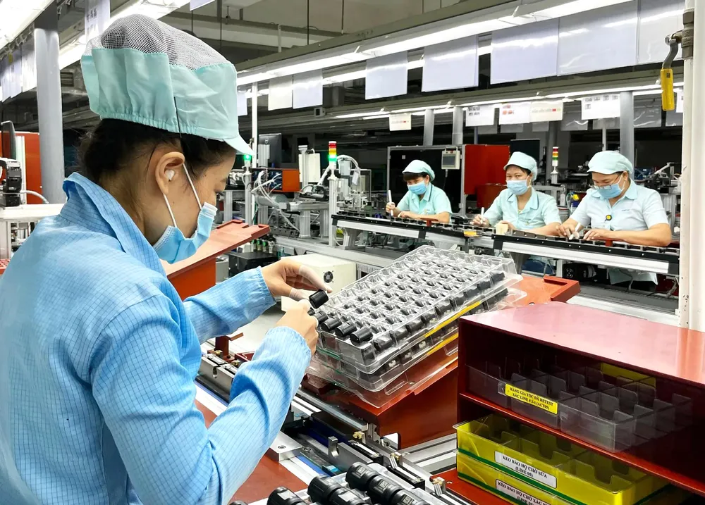Dây chuyền sản xuất ở Công ty TNHH Điện tử Foster, Khu công nghiệp VSIP II. Ảnh: PHƯƠNG LÊ DT(III).jpg