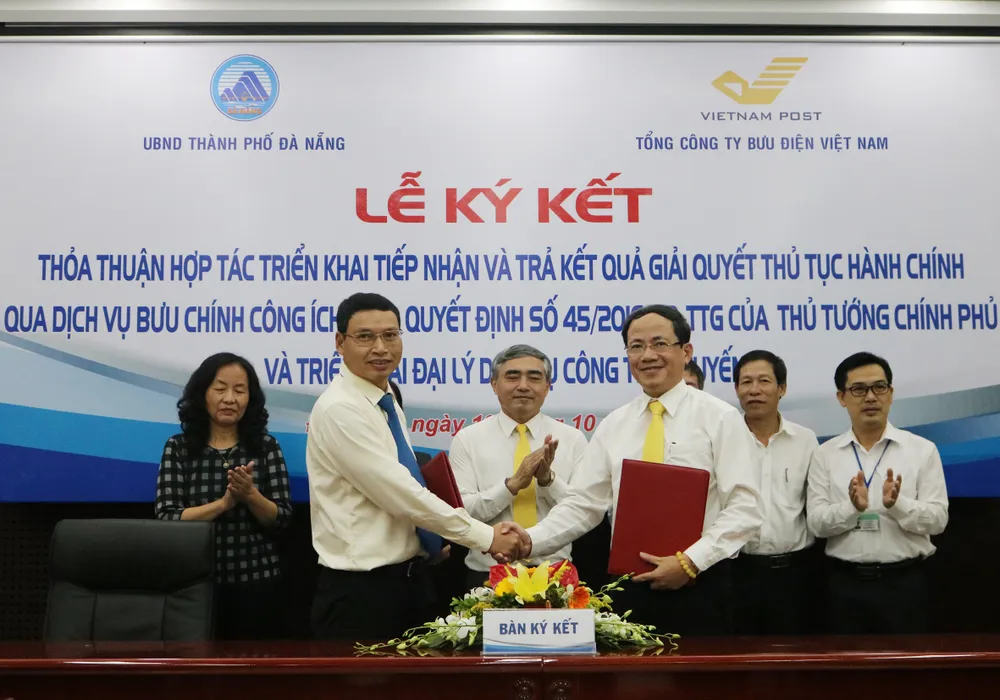 Đà Nẵng ký kết với VNPOST để đơn giản thủ tục hành chính công  ảnh 1