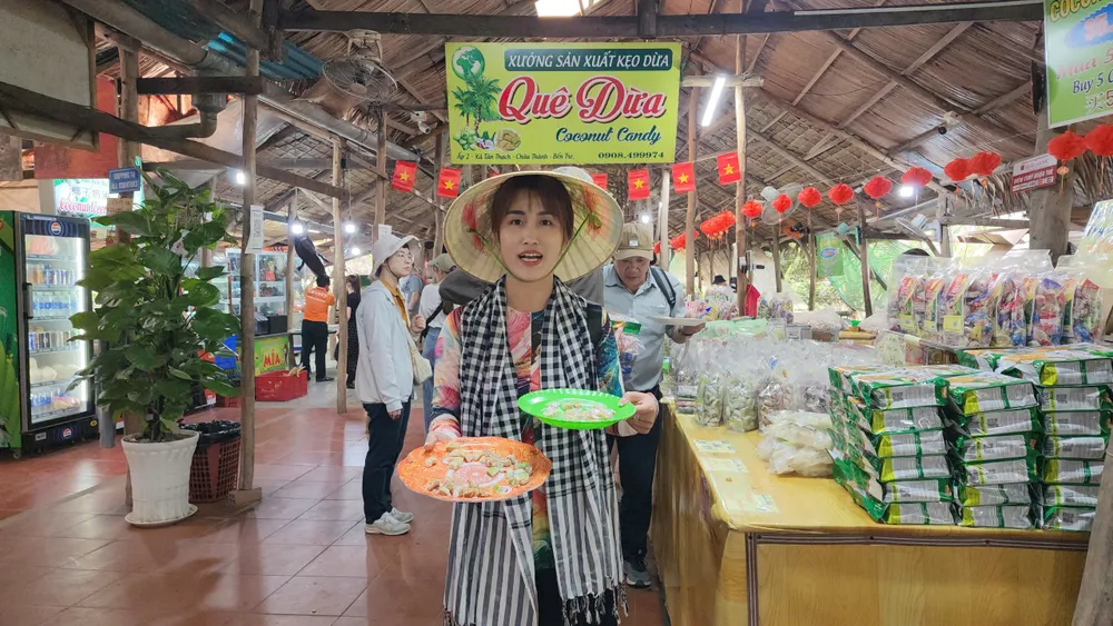 Trải nghiệm làng nghề sản xuất kẹo dừa truyền thống z6298303022025_73b94b32cbab07bc20359bafe7f14a50.jpg