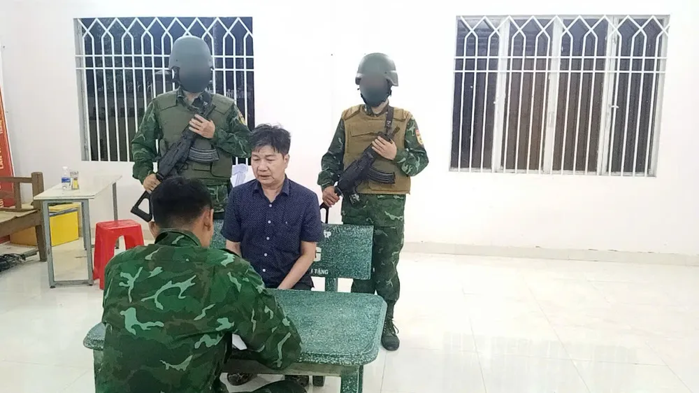 Đối tượng Tân khi bị bắt 1..jpg