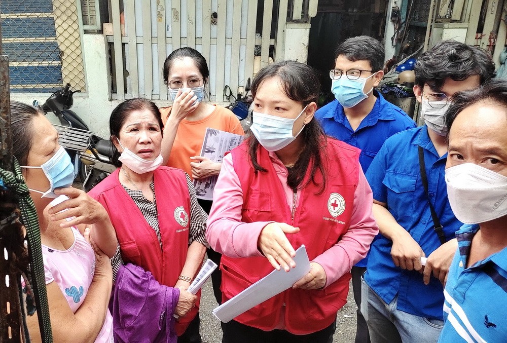 第六郡黨政領導接種疫苗 ảnh 2