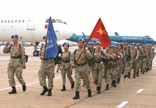 越南各一號工兵士兵和四號二級野戰醫院啟程執行任務。(圖:越通社)