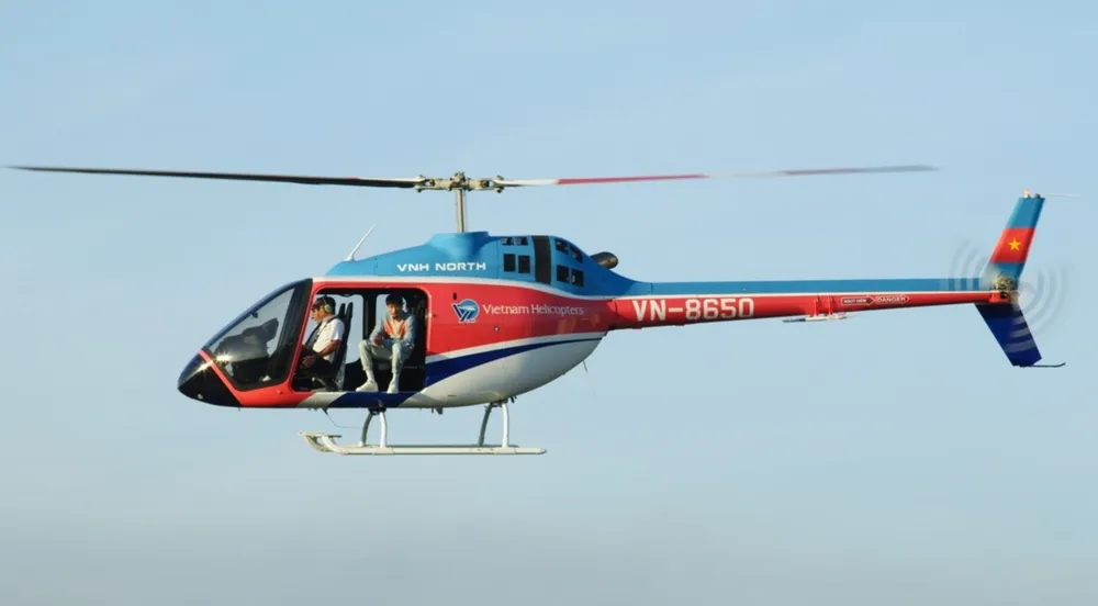 Hình ảnh chiếc máy bay Bell 505 số hiệu VN-8650 gặp nạn từng xuất hiện trong MV Trời hôm nay nhiều mây cực