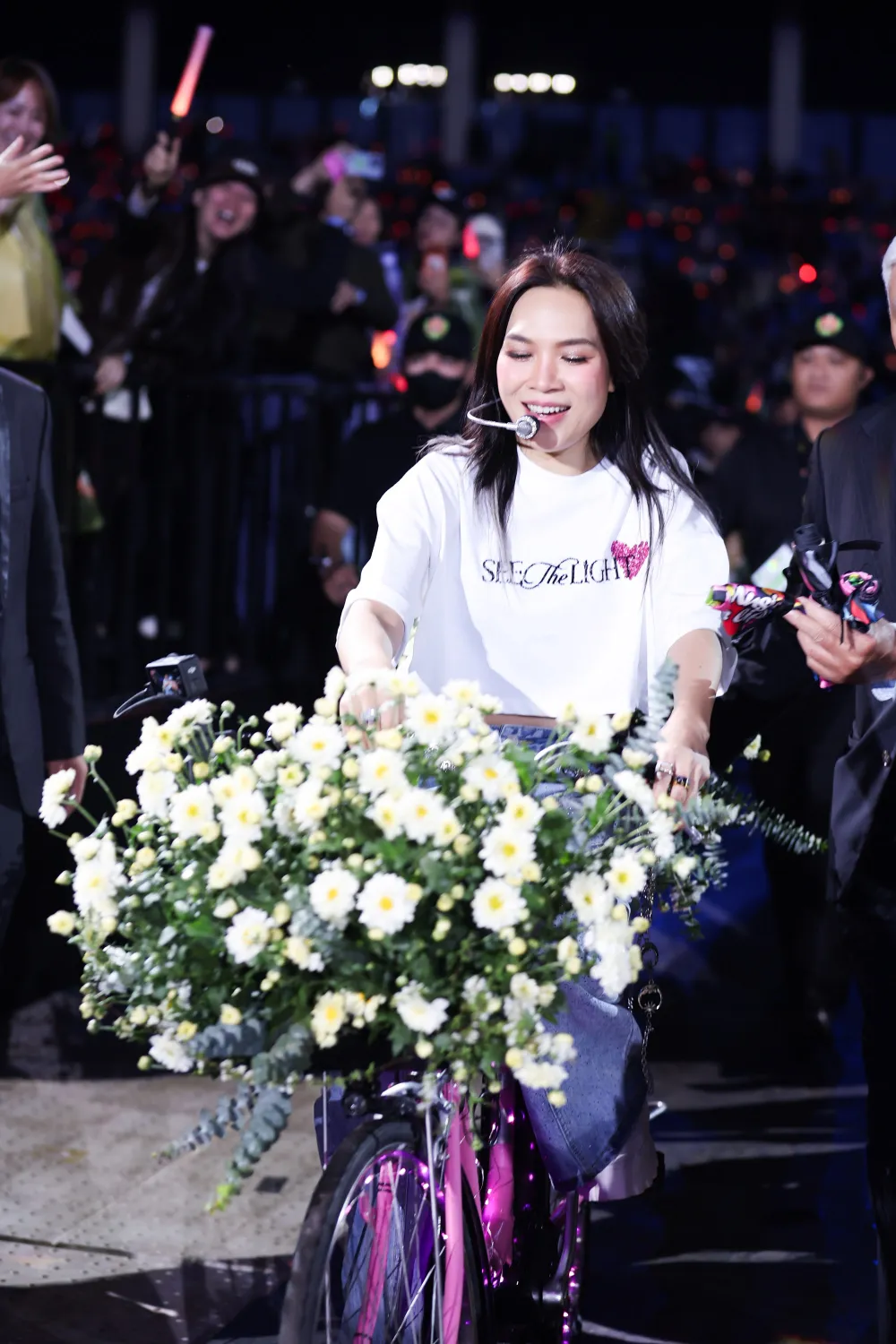 My Tam rode her bicycle, greeting each ticket booth area. TADA8760-2.jpg