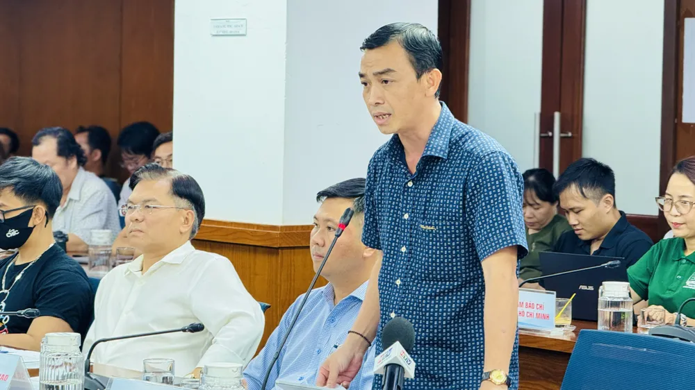 Ông Nguyễn Kiên Giang thông tin tại họp báo. Ảnh: Đình Dư bb8cebbee464533a0a75.jpg