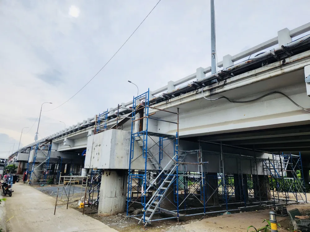Kể từ ngày 15-10, Cầu Bình Phước 1, sẽ được nâng tĩnh không thêm 1,25m e5eeb61d686ce532bc7d.jpg