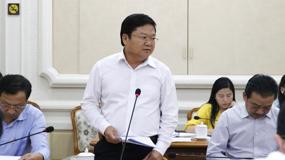 Giám đốc Sở LĐTB-XH TPHCM báo cáo tại buổi làm việc. Ảnh: NGÔ BÌNH Giám đốc Sở LĐTB-XH TPHCM báo cáo tại buổi làm việc. Ảnh: NGÔ BÌNH