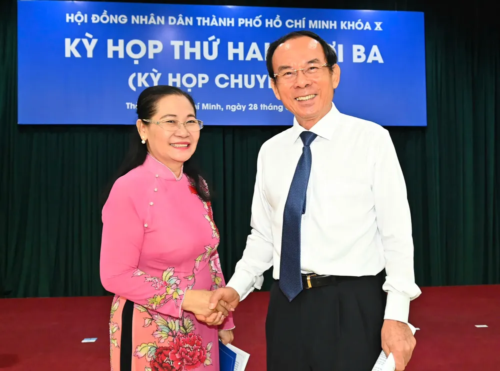 Bí thư Thành ủy TPHCM Nguyễn Văn Nên và Chủ tịch HĐND TPHCM Nguyễn Thị Lệ tại kỳ họp. Ảnh: VIỆT DŨNG z6750263439323_c07f885867299059eac51dafdfc3085e.jpg