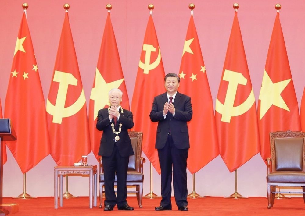 黨中央總書記阮富仲與中共中央總書記,國家主席習近平。