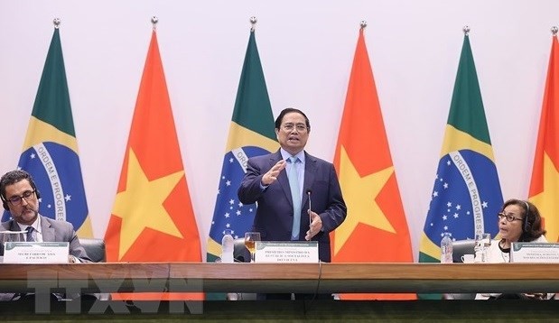 政府总理范明政出席在巴西外交部举行的座谈会。图自越通社