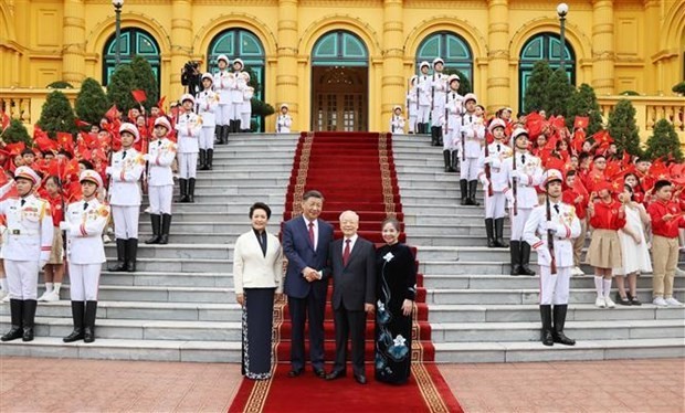 党中央总书记阮富仲主持仪式，欢迎中共中央总书记、中国国家主席习近平到访。图自越通社