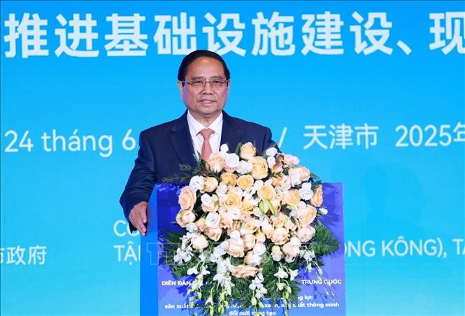 政府总理范明政出席中国-越南企业论坛。
