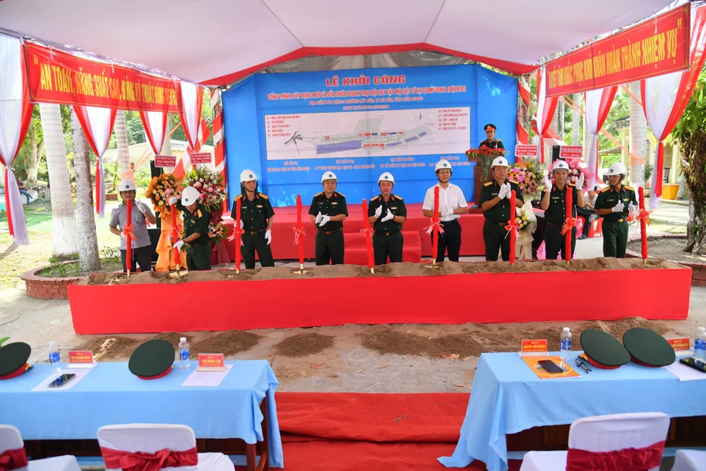 Các đại biểu thực hiện nghi thức khởi công xây dựng doanh trại Đội Quy tập mộ Liệt sĩ tại Campuchia Khởi công xây dựng mới doanh trại Đội Quy tập mộ Liệt sĩ tại Campuchia (Đội K92).jpg