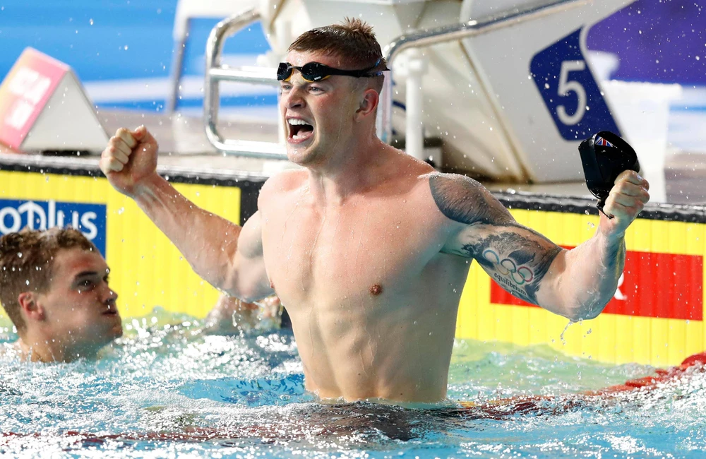 Adam Peaty ăn mừng chiến thắng sau khi lập kỉ lục thế giới. Ảnh: Getty Images