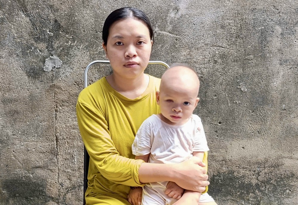 段氏春鲜与患病的幼子黎功福兴。