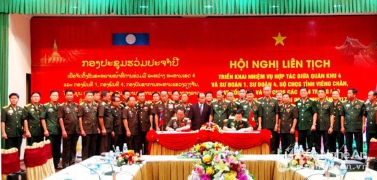 Delegates at the conference on cooperation between Military Zone 4 High Command and Laos’s military units in Nghe An province (Source: baonghean.vn)