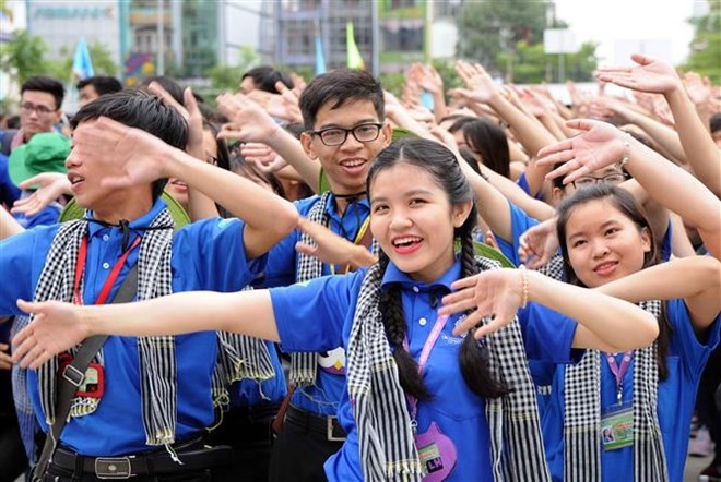 Volunteers at the opening ceremony (Photo: VNA)