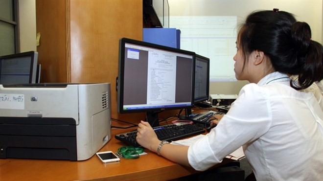 Trading transactions at the Hanoi Stock Exchange. (Source: VNA)