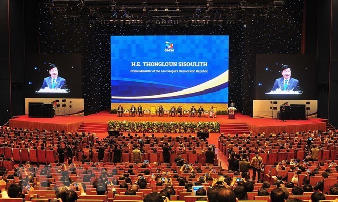 Lao Prime Minister Thongloun Sisoulith addesses the plenary session of the GMS Business Summit in Hanoi on March 30 (Photo: VNA)