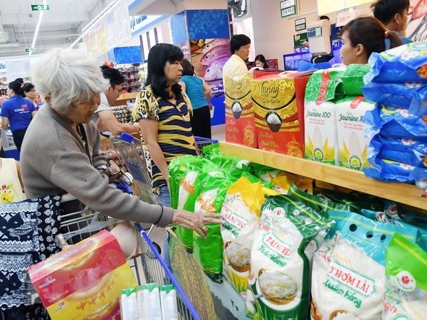 Customers shop at a supermarket in HCM City. (Photo: VNA)