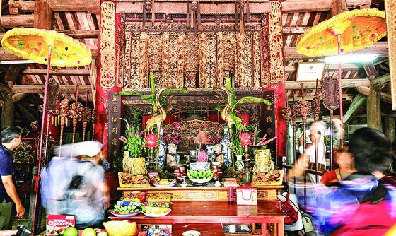 An antique hand carved wooden wall panel in Diem temple in Hoa Long Commune’s Viem Xa village in the northern province of Bac Ninh has been recognized as a national treasure.