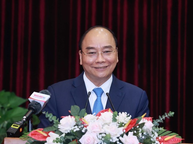 President Nguyen Xuan Phuc addresses the working session with Da Nang and Quang Nam. (Photo: VNA)