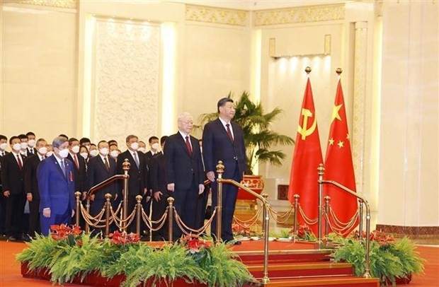 Welcome ceremony with cannon salute held for Vietnamese Party leader in China ảnh 2