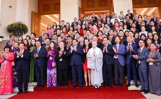 Prime Minister calls for their engagement in the Government’s efforts to bring Vietnam closer to the world. (Photo: SGGP)