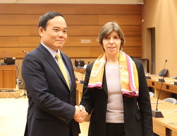 Deputy PM Tran Luu Quang and French FM Catherine Colonna. (Photo: VNA)