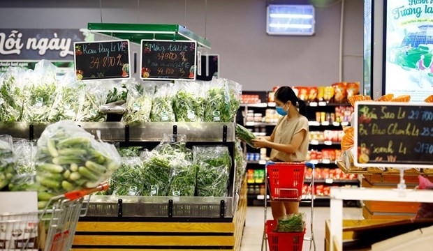 A customer at a WINCOMMERCE shopping mall (Photo: VNA) A customer at a WINCOMMERCE shopping mall (Photo: VNA)