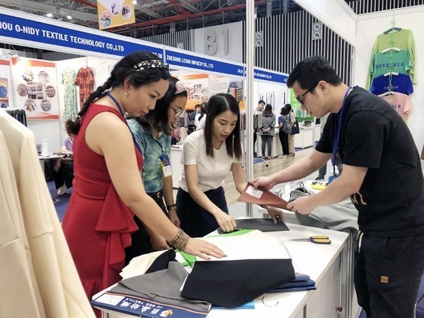 Visitors to SaigonFabric Summer 2023 opened in HCMC on July 26. (Photo: VNA)