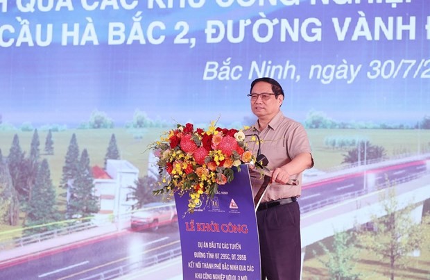 Prime Minister Pham Minh Chinh attended the groundbreaking ceremony for several transport infrastructure projects in the northern province of Bac Ninh on July 30. (Photo: VNA) Prime Minister Pham Minh Chinh attended the groundbreaking ceremony for several transport infrastructure projects in the northern province of Bac Ninh on July 30. (Photo: VNA)