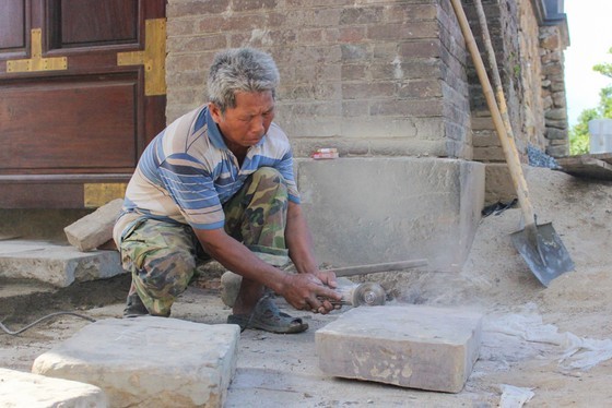 Workers are completing the remaining work of the restoration project.