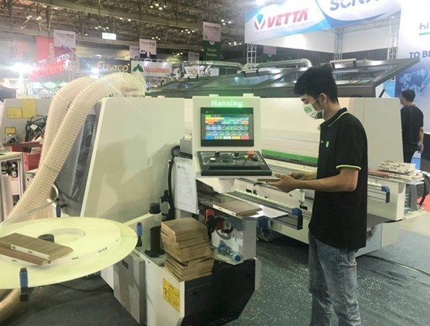 A booth at the 2022 Vietnam International Woodworking Industry Fair. This year&apos;s expo will be held in Ho Chi Minh from September 20 to 23. (Photo: VNA)