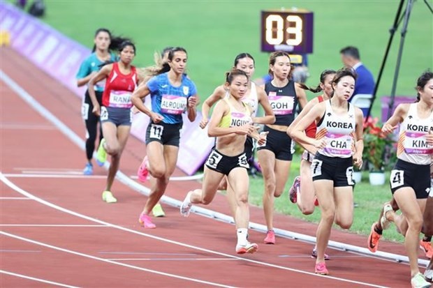 Nguyen Thi Oanh (in yellow) misses a medal chance in the 1,500-m event (Photo: VNA) Nguyen Thi Oanh (in yellow) misses a medal chance in the 1,500-m event (Photo: VNA)