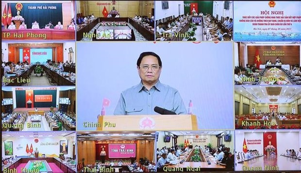 Prime Minister Pham Minh Chinh (centre) chairs the anti-IUU teleconference from Hanoi on October 7. (Photo: VNA) Prime Minister Pham Minh Chinh (centre) chairs the anti-IUU teleconference from Hanoi on October 7. (Photo: VNA)