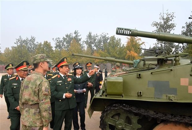 Gen. Phan Van Giang, Vice Secretary of the Central Military Commission and Minister of National Defense, visits Brigade 6 under the People's Liberation Army (PLA)’s Army Group 82. (Photo: VNA) Gen. Phan Van Giang, Vice Secretary of the Central Military Commission and Minister of National Defense, visits Brigade 6 under the People's Liberation Army (PLA)’s Army Group 82. (Photo: VNA)