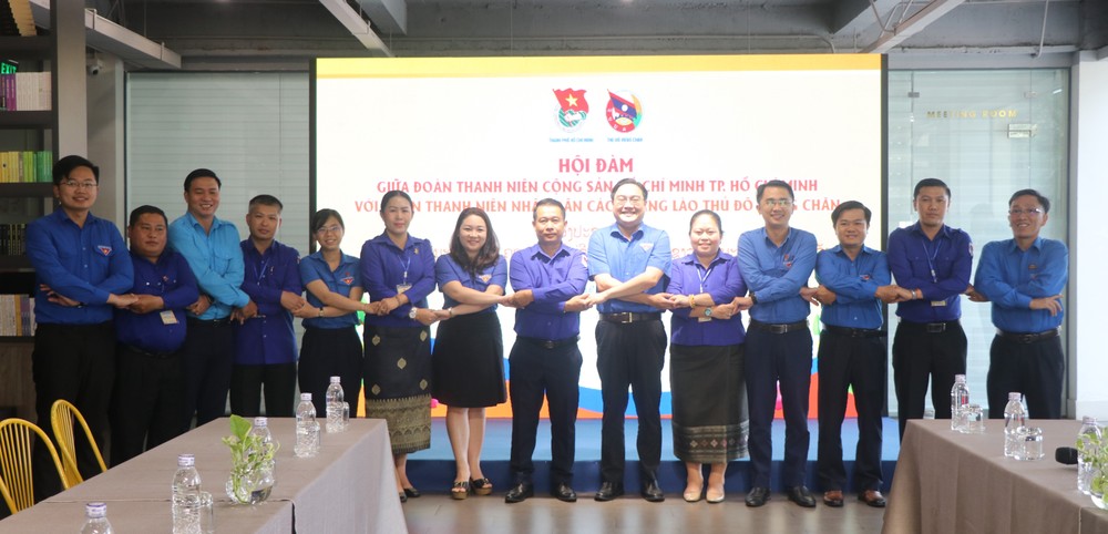 The Ho Chi Minh Communist Youth Union (HCYU) of HCMC and the Lao People's Revolutionary Youth Union (LPRYU) have a working session in the city on March 23. (Photo: SGGP) 9.jpg