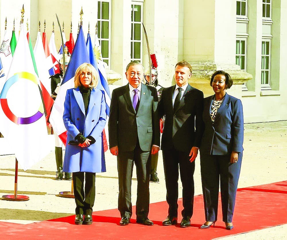 Party General Secretary and State President To Lam (2nd,L) and French President Emmanuel Macron (2nd, R) at the Global Vietnam - La Francophonie 2024 (Photo: SGGP) 212372a9-1a7f-41d7-9faf-062c1bc37fd4.jpg