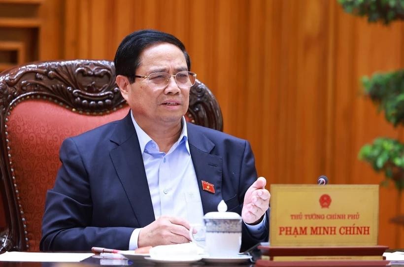 Prime Minister Pham Minh Chinh orders preparation to break ground on the Lao Cai – Hanoi – Hai Phong railway line on December 19. (Photo: VNA) vna-potal-thu-tuong-chu-tri-hop-ve-tinh-hinh-trien-khai-cac-tuyen-duong-sat-trong-diem-quoc-gia-8043934.jpg