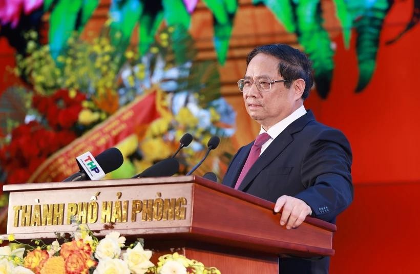 Prime Minister Pham Minh Chinh addresses the ceremony in Hai Phong city on June 30. (Photo: VNA) vna-potal-thu-tuong-du-le-cong-bo-cac-nghi-quyet-quyet-dinh-ve-sap-nhap-don-vi-hanh-chinh-tai-thanh-pho-hai-phong-8122168.jpg