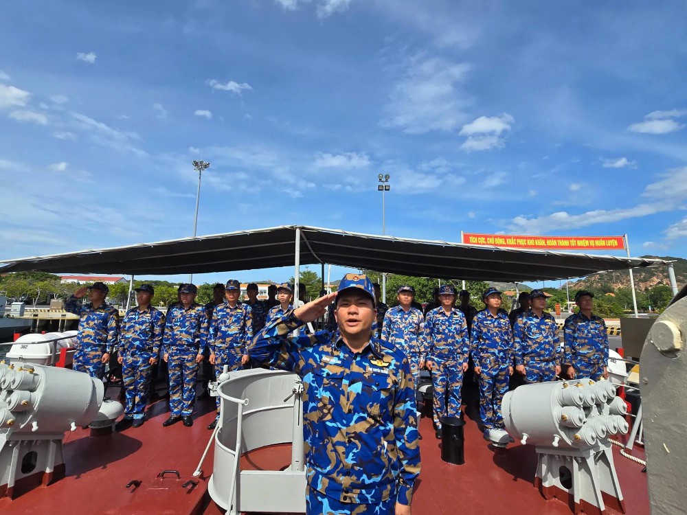 Practicing flag salute and national anthem singing at sea 12.jpg