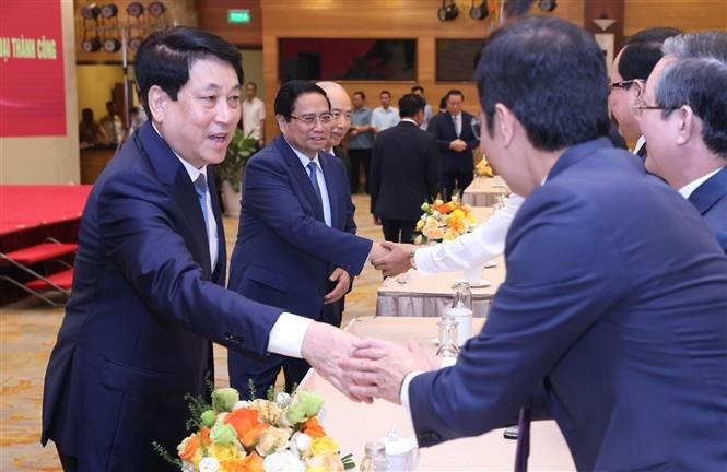 State President Luong Cuong and PM Pham Minh Chinh attend the gathering (Photo: VNA) he.jpg