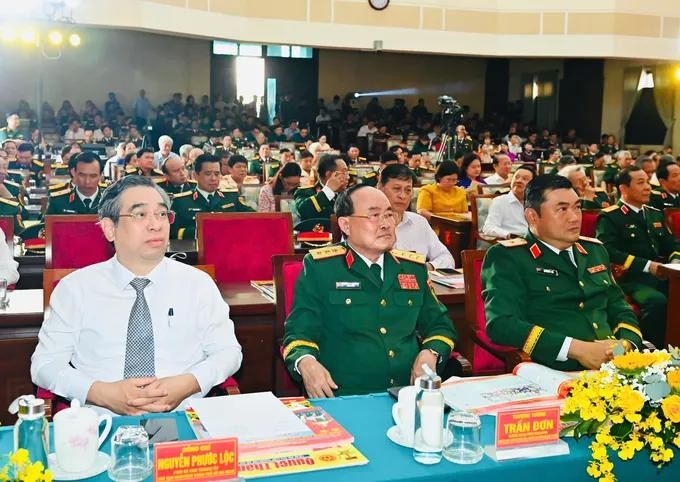 Vice Secretary of the Party Committee and Chairman of the Vietnam Fatherland Front Committee of Ho Chi Minh City, Nguyen Phuoc Loc (L) attends the event. (Photo: SGGP) 37.jpg