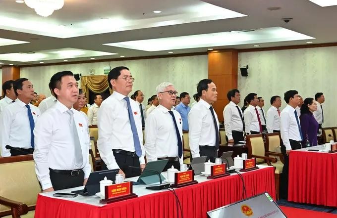 Delegates attend the flag-raising ceremony. (Photo: SGGP) 1.jpg