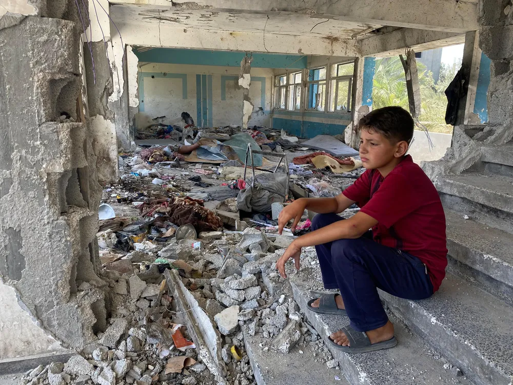 Một trường học bị phá hủy ở Gaza. Ảnh: UNRWA trường học.jpg