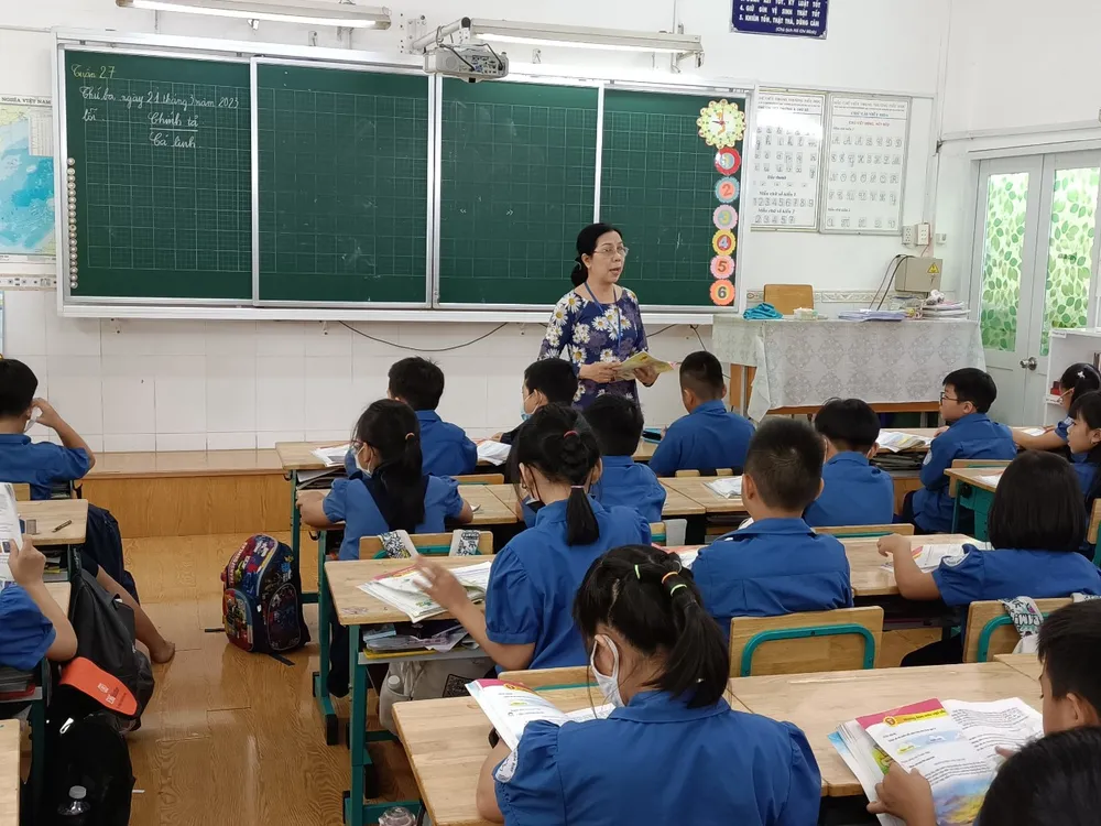 Một lớp học tại Trường Tiểu học Hòa Bình vào sáng 21-3 Một lớp học tại Trường Tiểu học Hòa Bình vào sáng 21-3