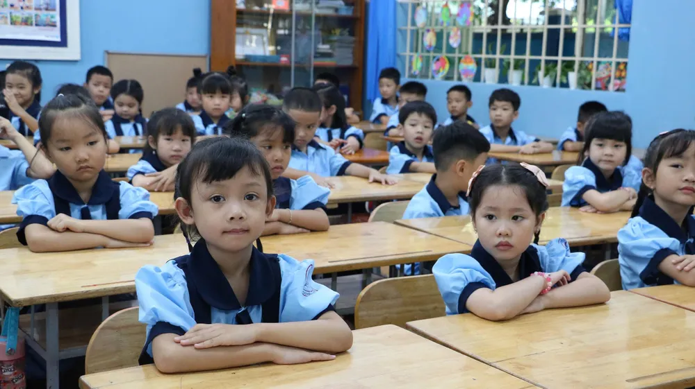 Học sinh Trường Tiểu học Nguyễn Văn Triết (phường Linh Xuân, TPHCM) trong ngày tựu trường năm học mới vào sáng 20-8
