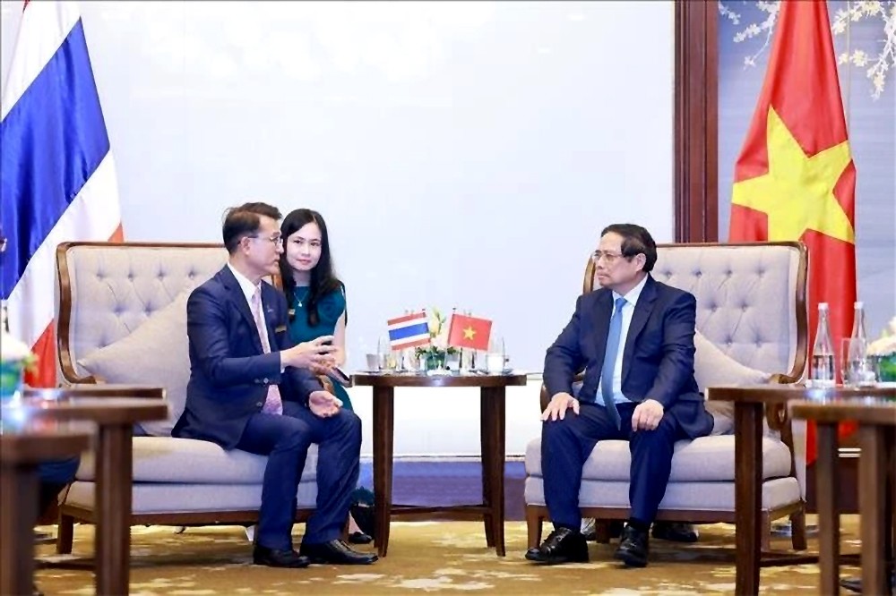 范明政总理会见开泰银行董事长钟拉·拉塔纳皮安。