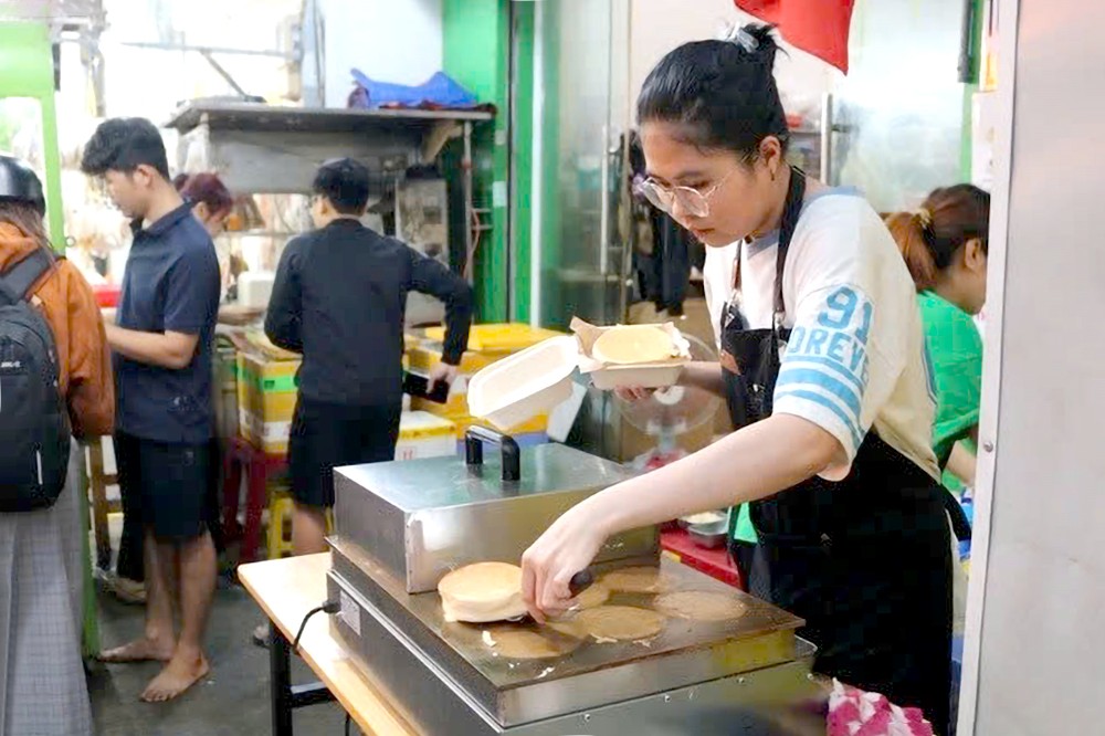 兼职工作不但能带来收入,而且还能帮助年轻人积累经验和技能。 26-6 GD2.jpg